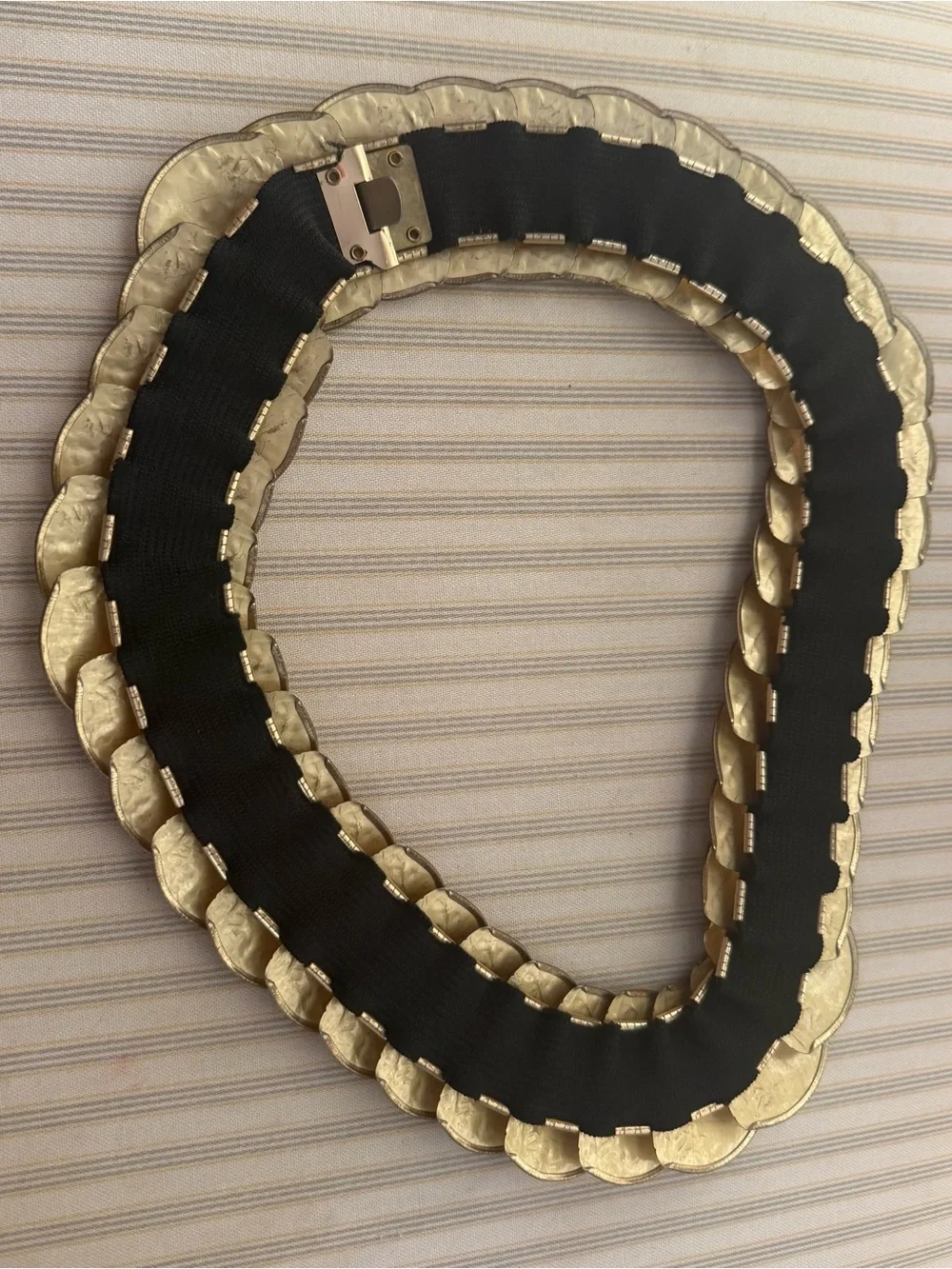 Vintage stretch Concha belt with gold-tone medallions. 28–42 inches long